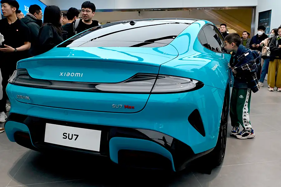 A Xiaomi Su7 electric car in a showroom in Beijing